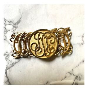 Gold tone vintage monogram bracelet